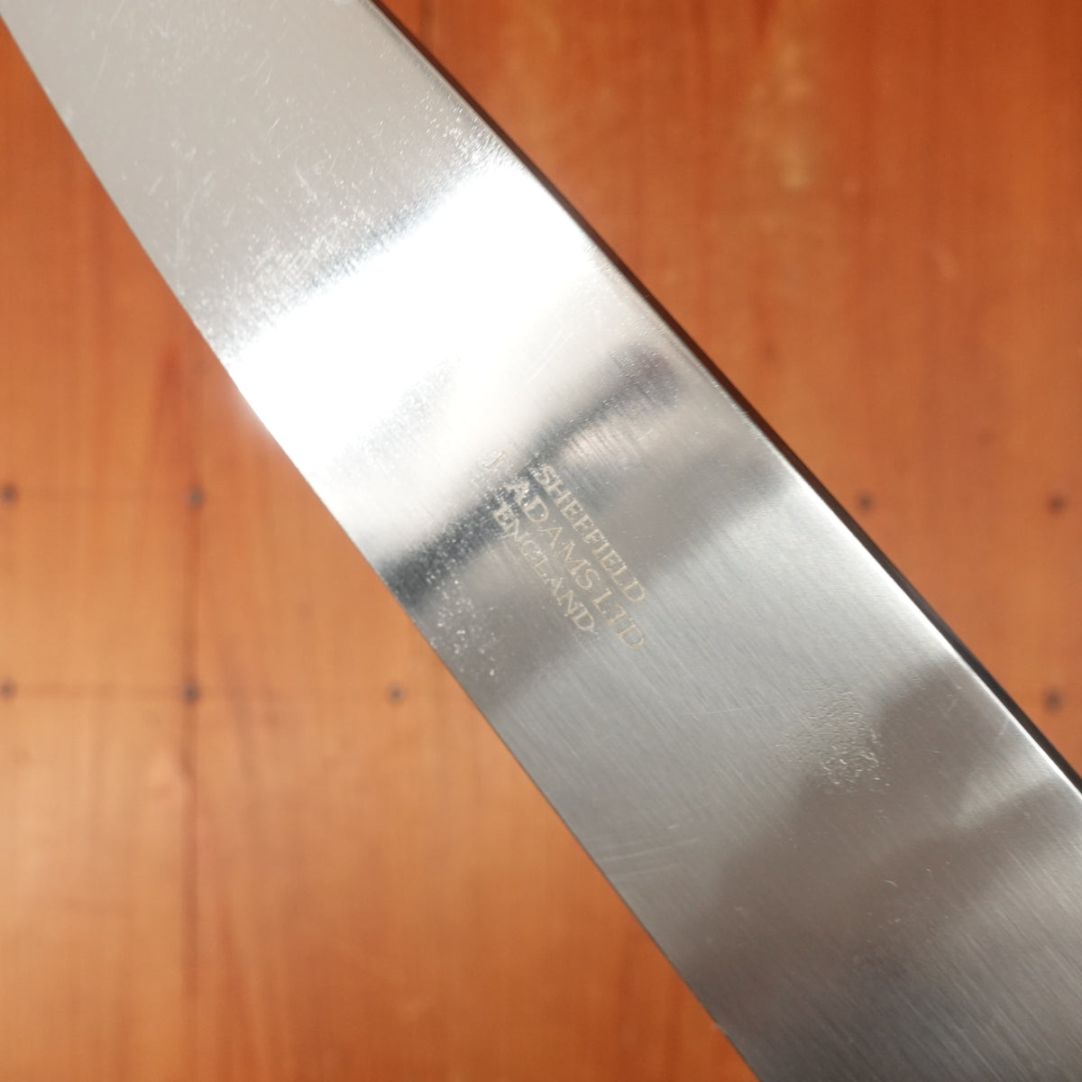 J Adams 8" Chef Knife Carbon Steel Palisander / Brass