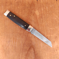 A Wright & Son 3 1/2" Senator Pocket Knife Carbon Steel Ebony Chased Spring