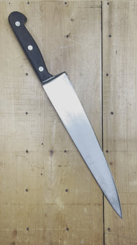 Hand forged and ground carbon steel knives like this largely ended in the mid 1960's in Solingen Germany being supplanted first by the removal of hand forging after drop forging and later by stainless steel and less hand grinding. As the older skilled workers retired and the cost of labor rose hand grinding on carbon steel was no longer the norm in Solingen. This knife represents a previous era where hand work was a pillar of Solingen production.