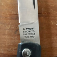 A Wright & Son Sheffield WW2 Issue Pattern 4 5/8" Clip Point Carbon Lockback Black Composite Handle