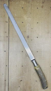 A very unusual American made flexible ham / salmon slicer re-handled with a stag handle. A set of American made knives with stag re-handles was found in a large collection recently, they are a little bit of a mystery but are nicely done and are excellent late 19th to early 20th century blades. Certainly not factory production handles however.