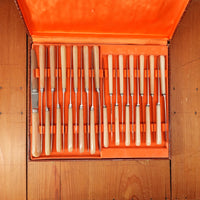 Queneuil Set of 12 Dinner & 12 Luncheon Knives Stainless Butterscotch Celluloid Neuchâtel France 1950s