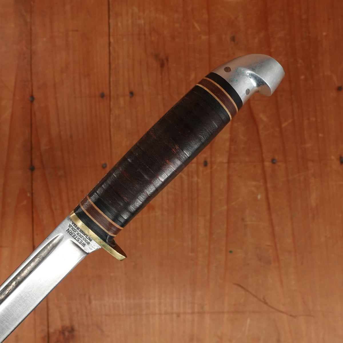 Western 4" Bird & Trout L4ABG Carbon Steel Stacked Leather 1950s