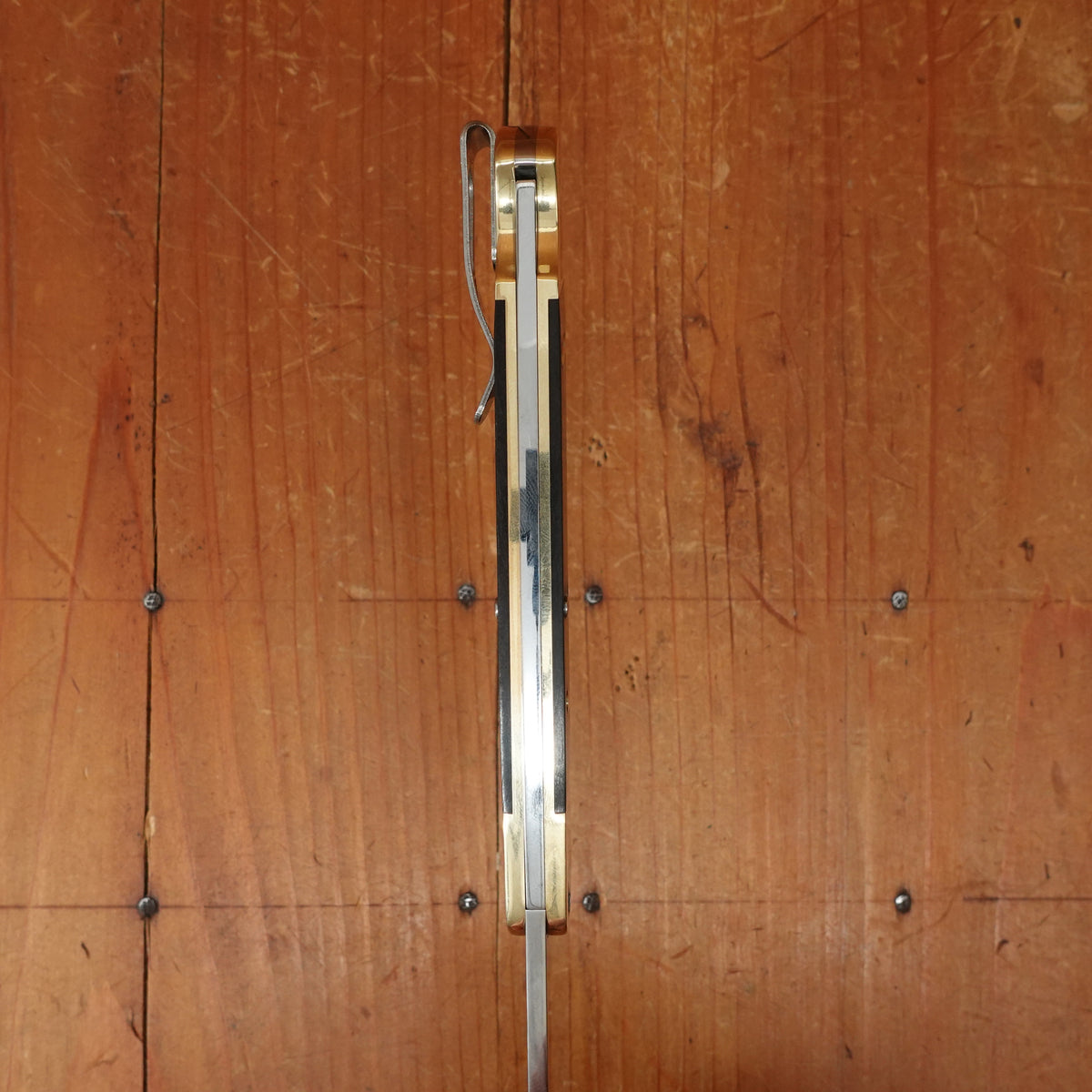 Buck Knives 110 Slim Heritage Elite - Brass
