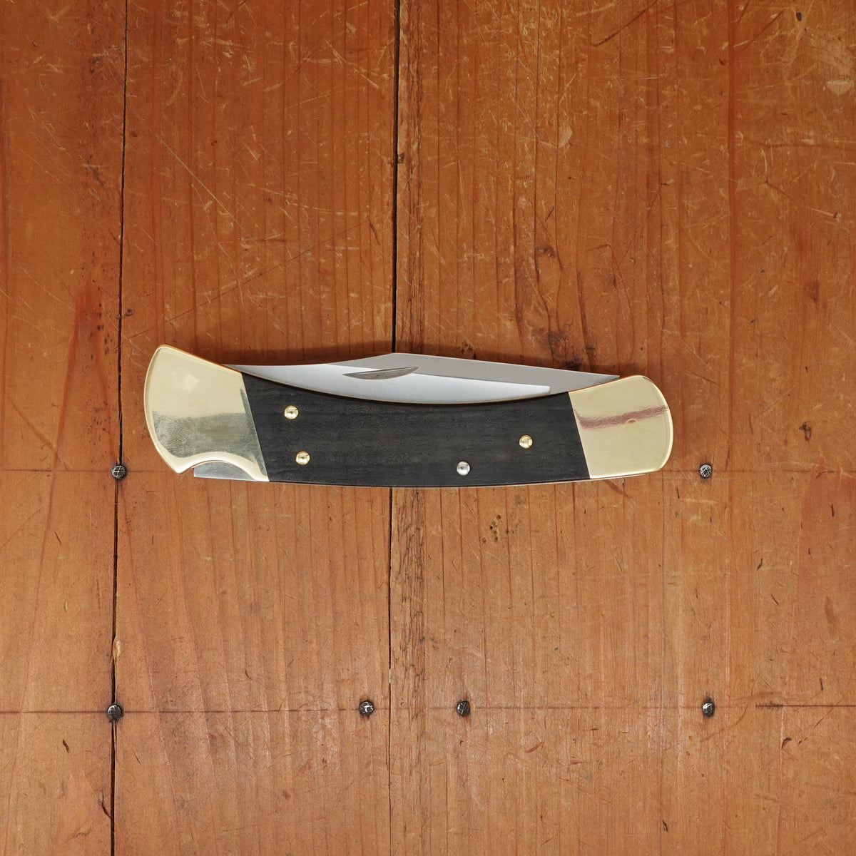 Buck Knives 110 Slim Heritage Elite - Brass