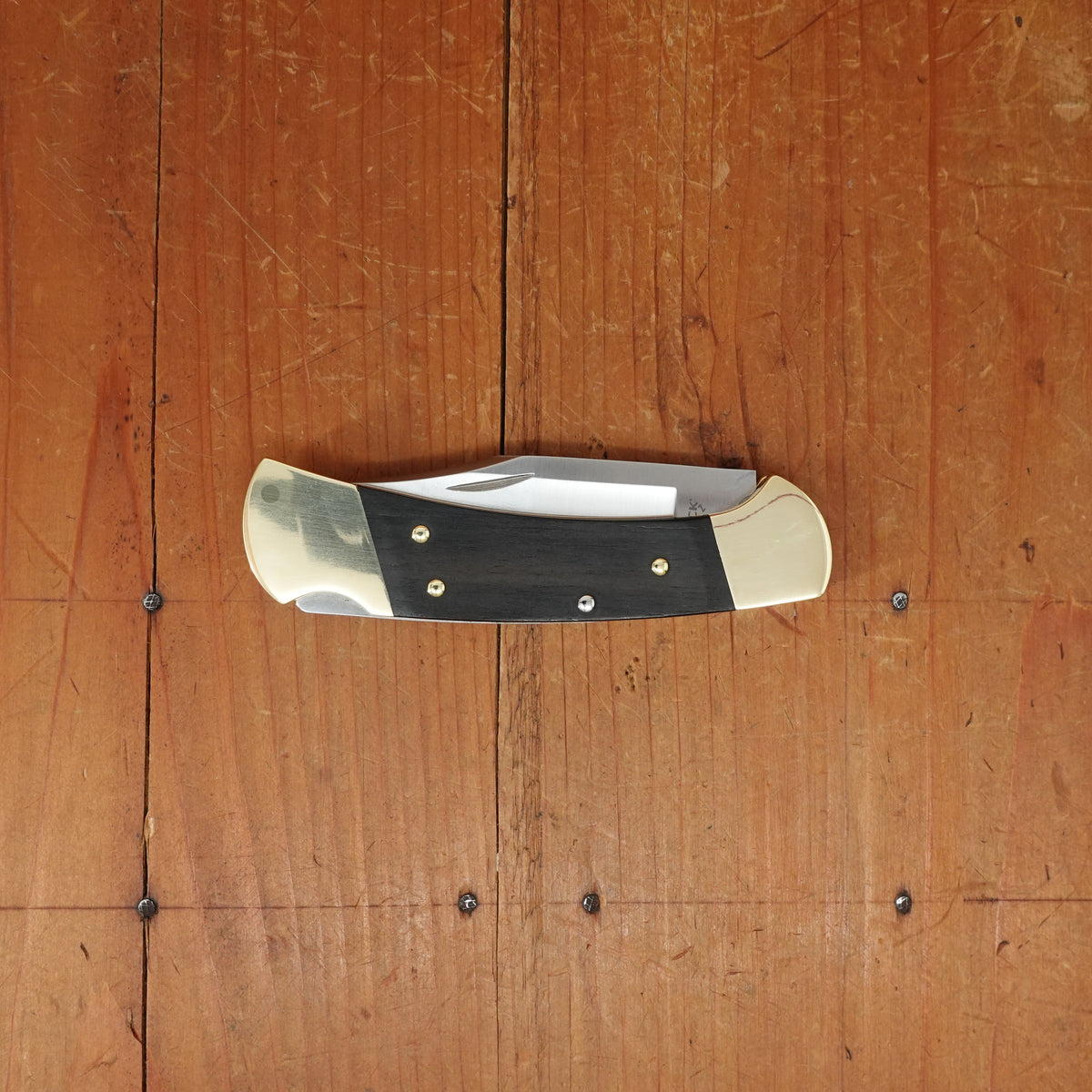 Buck Knives 112 Slim Heritage Elite - Brass