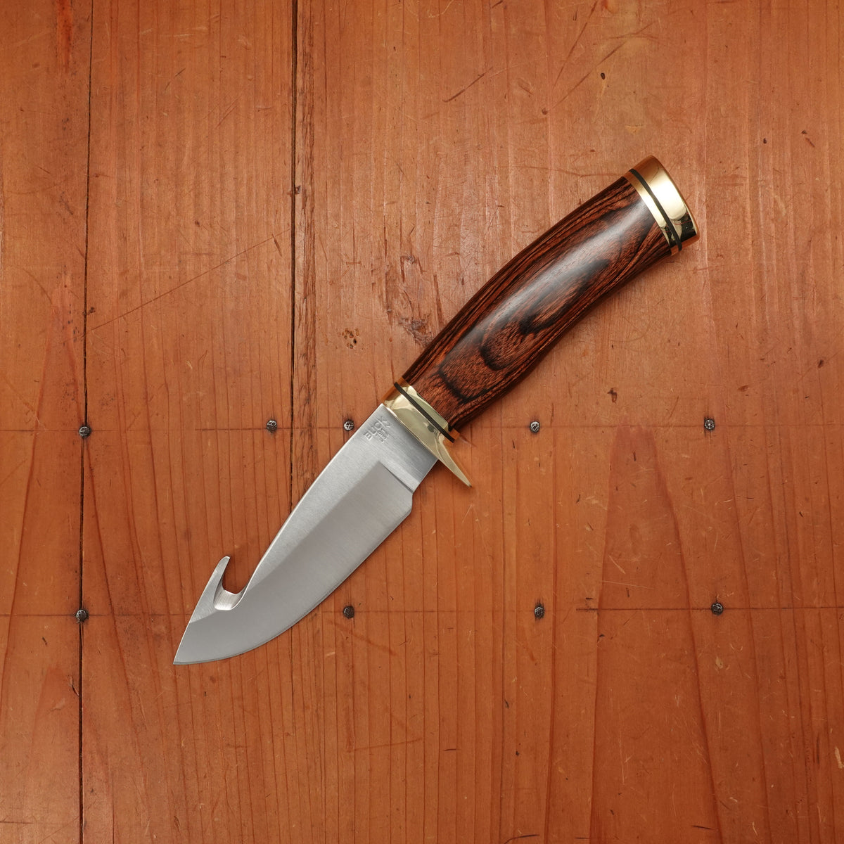 Buck 191 Zipper 4 1/4” Fixed Guthook 420HC Heritage Walnut Handle with Leather Sheath