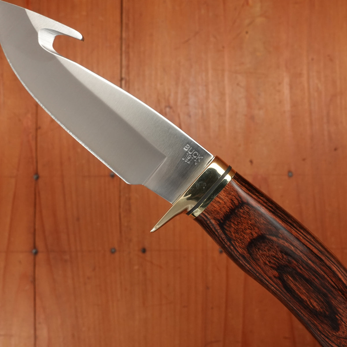 Buck 191 Zipper 4 1/4” Fixed Guthook 420HC Heritage Walnut Handle with Leather Sheath