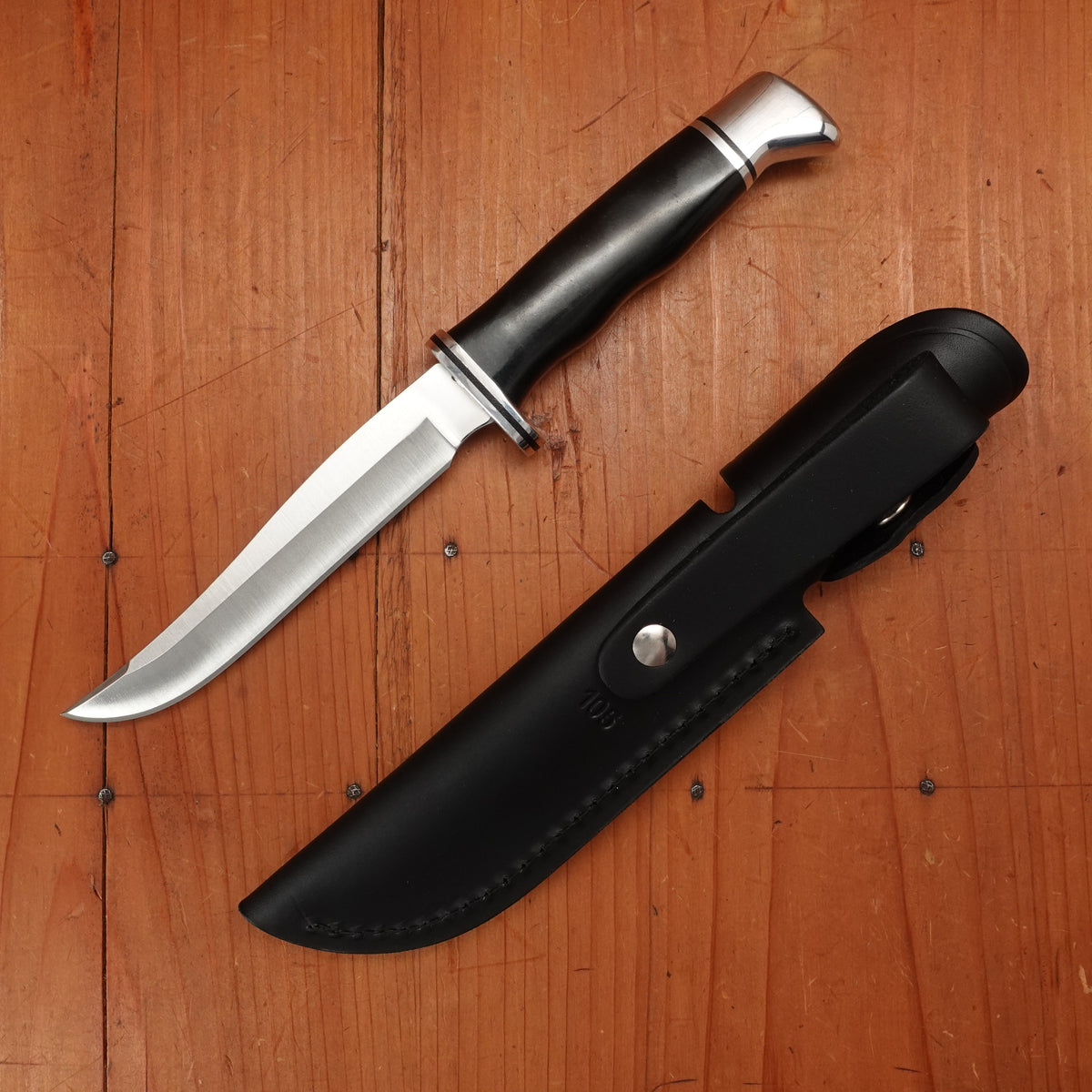 Buck 105 Pathfinder 5” Fixed Modified Clip Point 420HC Black Phenolic Handle with Leather Sheath