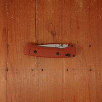 Benchmade 15090-01 SlipRidge™ Modified Drop Point MagnaCut® AXIS Lock Rust Orange G10 Handle
