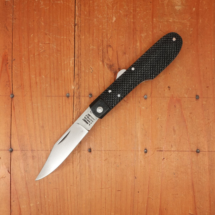 A Wright & Son Sheffield WW2 Issue Pattern 4 5/8" Clip Point Carbon Lockback Black Composite Handle