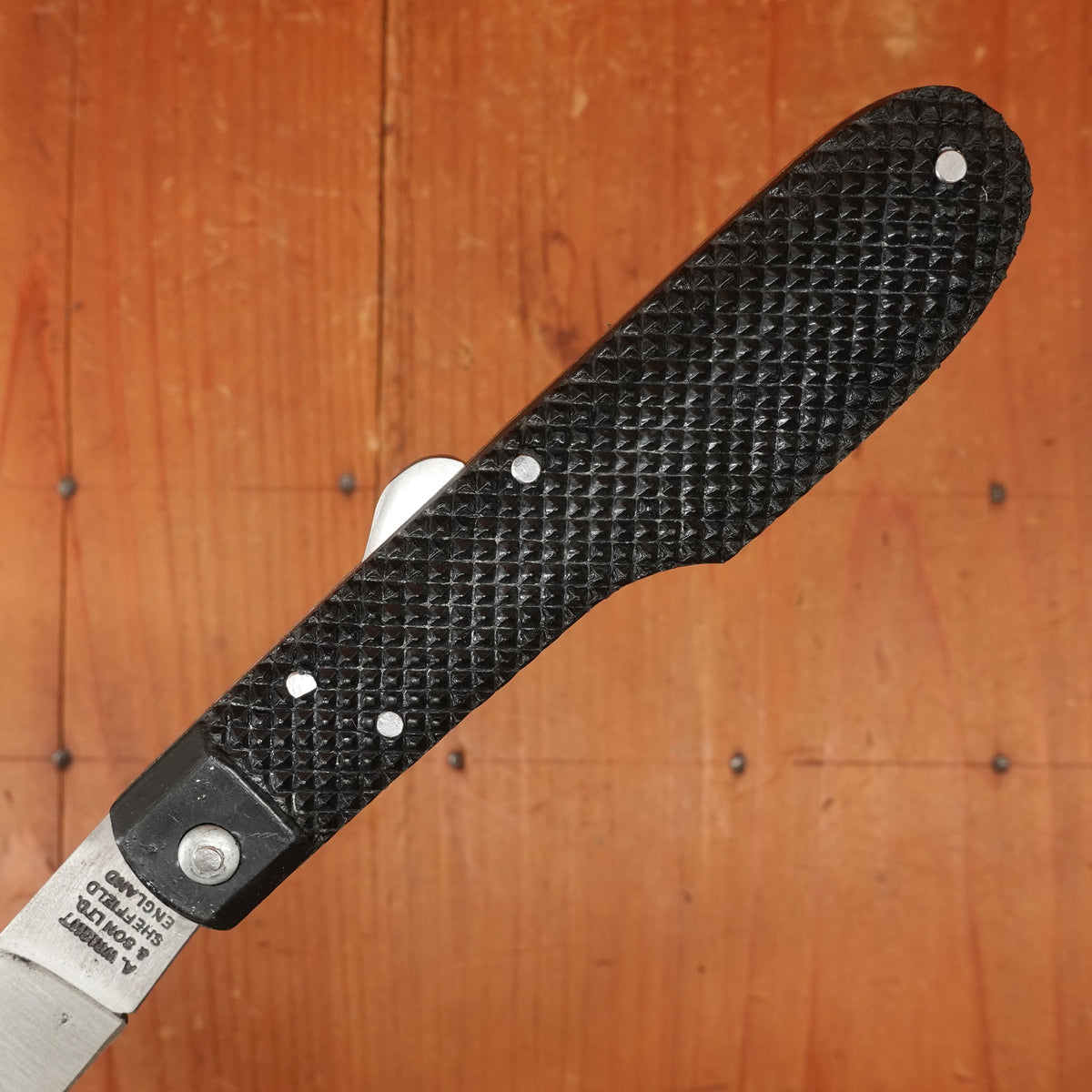 A Wright & Son Sheffield WW2 Issue Pattern 4 5/8" Clip Point Carbon Lockback Black Composite Handle