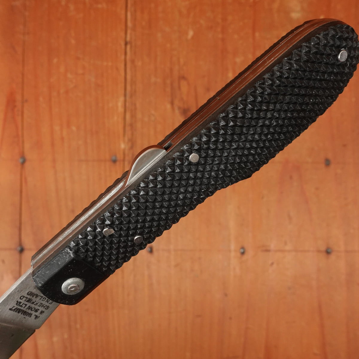 A Wright & Son Sheffield WW2 Issue Pattern 4 5/8" Clip Point Carbon Lockback Black Composite Handle