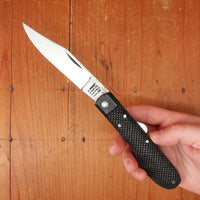 A Wright & Son Sheffield WW2 Issue Pattern 4 5/8" Clip Point Carbon Lockback Black Composite Handle