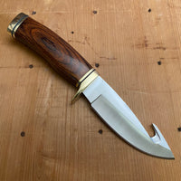 Buck 191 Zipper 4 1/8" Drop Point 420HC Fixed Blade Wood Handle with Guthook and Leather Sheath